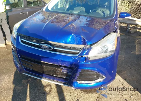 2013 Ford Escape Titanium z USA, uszkodzony, nr VIN 1FMCU0J92DUC41289
